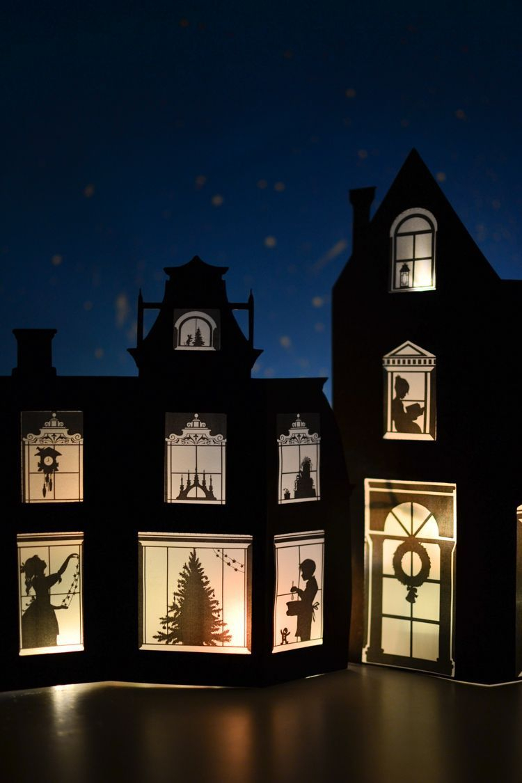 Christmas silhouette paper village with a printable